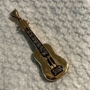 10k 
Gold Guitar Necklace with Sparkling Champagne Diamond Accents